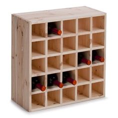 a wooden wine rack filled with lots of bottles