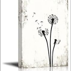 a dandelion painting on a white wall