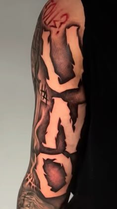 a man's arm with some ink on it