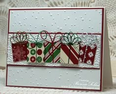 a close up of a card with presents on it