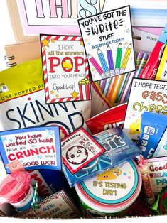 a basket filled with lots of different items and writing on it's paper bags