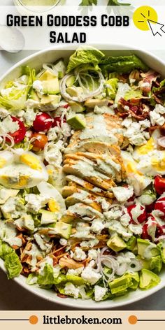 a salad with chicken, lettuce and tomatoes is shown in a white bowl