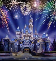 a castle with fireworks in the background