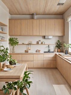 a kitchen filled with lots of wooden cabinets and counter top space next to a window