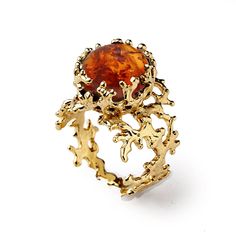 Inspired by the marvelous variety of life forms, colors and shapes of the reef ecosystem, this charming ring depicts the image of a coral guesting in its structure a beautiful Baltic Amber cabochon. The design enhances the light of the gemstone, adding a note of surprise to this ring. This ring is part of our trademark collection inspired by my fascination for the magic of the underwater world.  See the actual ring in 360 degree video on our Youtube channel - https://bit.ly/2QX713N  All our jewe Amber Ring Gold, Amber Engagement Ring, Italian Gold Jewelry, Unique Gold Rings, Beachy Wedding, Orange Gem, Orange Jewelry, Baltic Amber Jewelry, Gold Gemstone Ring