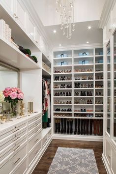 an image of a walk in closet with shoes