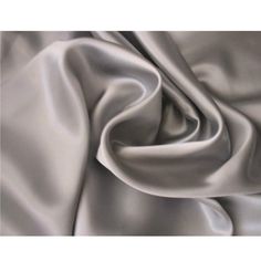 an image of a white satin fabric with very soft folds on the top and bottom