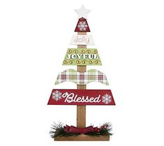 a christmas tree made out of wood with the words, joyful and blessing written on it