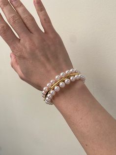 New without tags Assael Forever 18k gold pearl bangle, with 7.5-8mm Akoya cultured pearls. Retail $16000. DESIGNER: Assael MATERIAL: 18k Gold GEMSTONES: Pearl DIMENSIONS: Bracelet will fit approx. up to 7" wrist and is 19mm wide. WEIGHT: 48.4 grams MARKED/TESTED: Assael, 750. CONDITION: New/Store Sample Pearl Bangle Designs, Telugu Jewellery, Pearl Bangles Gold, Pearl Bangles, Haldi Outfits, Pearl Bangle, India Jewelry, Bangle Designs, Gold Bangle Bracelet