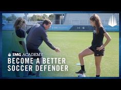 two people on a soccer field with the words become a better soccer defender