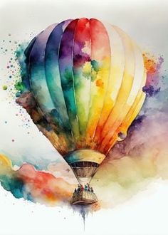 a colorful hot air balloon flying in the sky with watercolor paint splatters on it