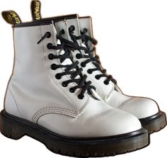 White Combat Boots With Round Toe For Streetwear, White Round Toe Combat Boots For Streetwear, White Ankle Combat Boots For Streetwear, Casual White Lace-up Boots For Streetwear, White Ankle Boot Combat Boots For Streetwear, White High Ankle Boots With Laces, White High-top Lace-up Boots For Streetwear, White Combat Boots For Winter Streetwear, Casual White High-top Moto Boots