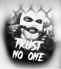 a black and white photo with the words trust, no one on it's face