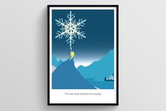 a snowflake is hanging on the wall next to a black framed poster that says,