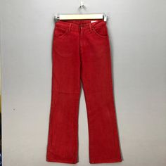 Vintage Wrangler Bell Bottom Jeans Wrangler Wide Leg Denim - BS90092.  Manual Measurement (laying in flat area):  1) Waist: 27 inch.  2) Rise: 10.5 inch.  3) Hips: 36 inch.  4) Tight: 20 inch.  5) Outseam: 40 inch.  6) Inseam: 30 inch.  7) Leg opening: 9 inch.  Made In: JAPAN.  Fabric Material: 100% Denim Cotton.  Condition: In good vintage condition overall.  Please check all the measurement to ensure a proper fit.  Remember to allow yourself some extra room for movement.  You can compare these High Rise Red Flare Jeans For Fall, Red High Rise Flare Jeans For Fall, Casual Red High Rise Flare Jeans, Trendy Red Cotton Flare Jeans, Retro Red Wide Leg Jeans, Retro Fitted Red Jeans, Vintage Red Wide Leg Jeans, Vintage Wide Leg Red Jeans, Vintage Red Wide-leg Jeans