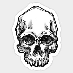 a black and white drawing of a skull