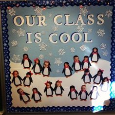 a sign that says our class is cool with penguins and snowflakes on it