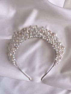 Goddess crown. Made with high quality freshwater pearls, crystal beads. Here you can find : wedding earrings: https://www.etsy.com/shop/AtmanRay/edit?ref=edit_trust_header&section_id=30037784 bridal hair combs: https://www.etsy.com/your/shops/AtmanRay/tools/listings/section:34235899 bridal hair vines: https://www.etsy.com/your/shops/AtmanRay/tools/listings/section:34454797 bridal hair pines: https://www.etsy.com/your/shops/AtmanRay/tools/listings/section:34666265 wedding hair bands: https://www. Wedding Hair Bands, Bridal Hair Vines, Pearl Jewelery, Bridal Hair Combs, Crown Bride, Pearl Crown, Goddess Crown, Crown Silver, Wedding Hairband