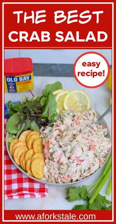 crab salad with crackers and lemon wedges on the side