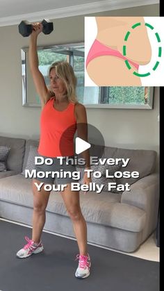 a woman is doing exercises with dumbbells in her living room