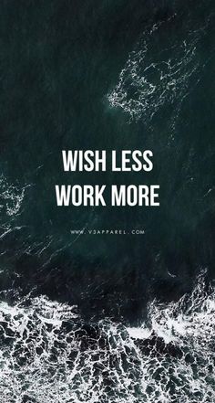 the words wish less work more on top of an ocean