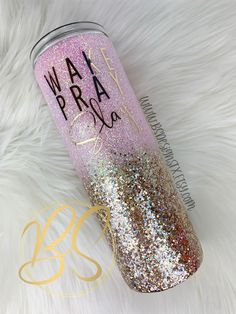 a pink and gold glitter tumbler with the words waaa pride written on it