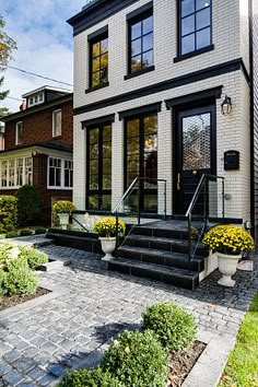 a house with steps leading up to the front door