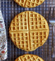 three waffles sitting on top of a cooling rack