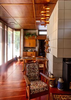 a living room filled with furniture and a fire place