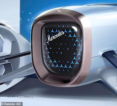 a futuristic car with the word mercedes on it's side