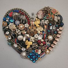 This Unique Collage Of Upcycled Vintage Jewelry Is At Home On A Black 12" x 10" x 1" Wooden Heart...This Will Be A Special Valentine Or Birthday Gift For Your Special Someone... FREE STANDARD SHIPPING WITHIN THE U.S Jewelry Shadow Box, Old Jewelry Crafts, Upcycled Vintage Jewelry, Mixed Media Wall Art, Vintage Jewelry Ideas, Jewelry Frames, Vintage Jewelry Repurposed, Fun Crafts To Do, Vintage Jewelry Crafts