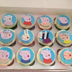 the cupcakes are decorated with peppa pig faces and other cartoon characters on them