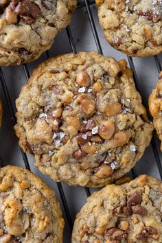 cookies with nuts and chocolate chips on a cooling rack