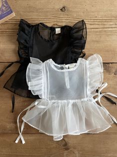 Colour: Ivory, Black Like angel wings, this chiffon vest will make any baby outfit special. The wing sleeves filled with frills add a lovely touch. Available Size: One (Recommend to under 18M) Cotton100 Size Height Age 6M 75 cm 3-6mths 12M 80 cm 6-12mths 18M 85 cm 12-24mths Ethically made with love in Korea.All Korean clothes are KC certified for guaranteed safety and quality for kids. Dress With Vest, Wing Sleeves, Korean Clothes