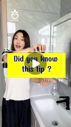 a woman holding up a sign that says did you know this tip?