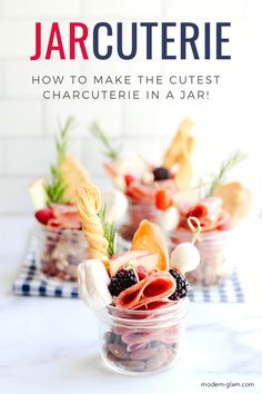 jars filled with food sitting on top of a table