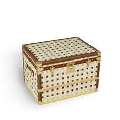 a brown and white basket sitting on top of a table