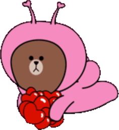 a pink teddy bear with red hearts in its paws and wearing a pink outfit that is shaped like a heart