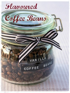 a jar filled with coffee beans sitting on top of a table