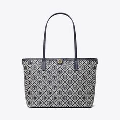 T Monogram is a classic pattern inspired by traditional Pennsylvania Dutch quilting. Meticulously crafted in woven jacquard, the collection speaks to the timelessness of great style.The small tote is trimmed in fine leather, with a zip-top closure. Lined in soft microsuede, the interior has pockets for organization. Every detail is considered, with special attention to function and versatility. Classic Monogram Print Shopping Bags, Classic Monogram Print Shoulder Bag, Classic Monogram Print Shoulder Bag For Everyday, Elegant Shoulder Bag With Monogram Print For Shopping, Elegant Monogram Print Shoulder Bag For Shopping, Classic Bags With Monogram Print In Coated Canvas, T Monogram, Pennsylvania Dutch, Designer Tote Bags