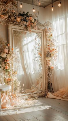 Elegant spring wedding photo zone featuring hanging floral installations, soft pastel fabrics, and a vintage-style antique frame backdrop accented with fairy lights. Captured in warm, natural light. Birthday Tags, Tags, Birthday, Quick Saves