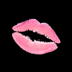 a pink lip is shown against a black background