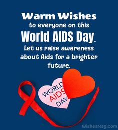 a red ribbon and two hearts with the words world aids day written on it, against a blue background