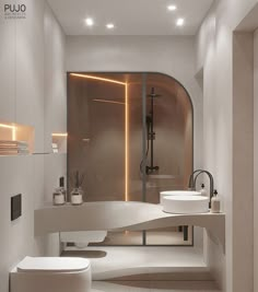 a modern bathroom with two sinks and a large bathtub in the middle of the room