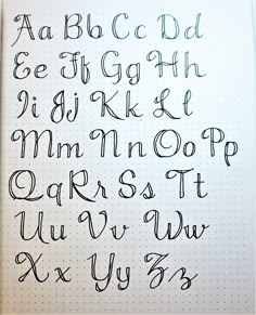 the letters and numbers are written in cursive writing on a sheet of paper