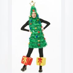 a woman dressed in a christmas tree costume