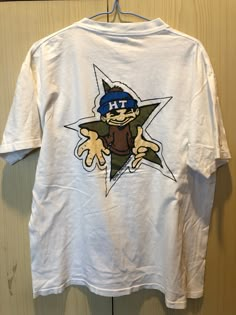 Onieta tag 90s hip hop graffiti hype thread rap vtg tees t shirt white M : 100% authentic product : size ( tag L fits more M ) Made In USA : armpit to armpit = 22.5" : total length= 26" : condition = (USED) great condition ALL OFFER WILL BE CONSIDER PLEASE CONTACT .PAYMENT & SHIPPING. : FOR PAYMENT WE ONLY ACCEPT PAYMENT VIA PAYPAL. : PLEASE MAKE THE PAYMENT WITHIN 7DAYS AFTER THE TRANSACTION ENDS. :   DELIVERY TIME SHOULD BE AROUND 8-25DAYS DEPENDING ON YOUR WORLDZONE, :  ITEM WILL BE SEND OUT TO WORLDWIDE FROM THAILAND VIA THAILAND REGISTERED INTERNATIONAL AIRMAIL WITH TRACKING NUMBER. : DISCOUNT FOR COMBINE POSTAGE IS  -USD FOR THE FISRT ITEM AND -USD FOR AN EACH ADDTIONAL ITEM,SO IF YOU ARE WIN MORE THAN ONE ITEM PLEASE WAIT FOR YOUR NEW TOTAL INVOICE WITH DISCOUNT BEFORE MAKE THE PAYM White Graphic Print T-shirt For Skateboarding, 90s Style Pre-shrunk White T-shirt, Casual Graffiti Print Fan Merchandise T-shirt, White Retro T-shirt With Graffiti Print, Casual Graffiti Print T-shirt For Fan Merchandise, Casual Graffiti Print T-shirt For Fans, 90s Style Cotton T-shirt With Graffiti Print, 90s White Fan Merchandise T-shirt, White Urban T-shirt For Skateboarding