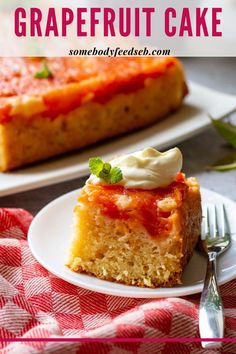 a slice of grapefruit cake on a white plate with a fork next to it