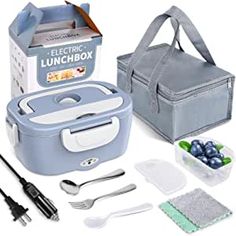 an electric lunch box with utensils and other items