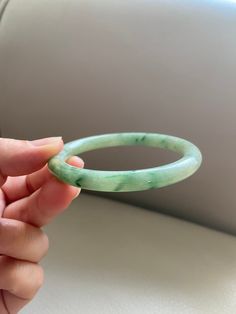 "🌈 Jade Bangle 57.0mm (2.24\"), Round Shape, Light Green 🌷 Untreated Natural Jadeite/ Grade A Jade/ Certified 🌷 Jade from Myanmar/ Burma 🌷 100% handmade carving 🌷 Inner diameter : 57.0mm / 2.24\" 🌷 Shape : Round 🌷 Color : Light Green 🌷 Free standard shipping from Hong Kong with tracking included 🌷 Take approximately 7-21 days to arrive worldwide ❤️ In Chinese Culture: Young people wear jade pendant will have a prosperous life, attracts good luck and friendship Old people wear jade penda Carved Jade Round Bracelets, Carved Jade Bracelets, Green Carved Round Bangle, Carved Jade Bracelet, Lavender Green, Jade Bangle, Gemstones Jewelry, Jade Pendant, Chinese Culture